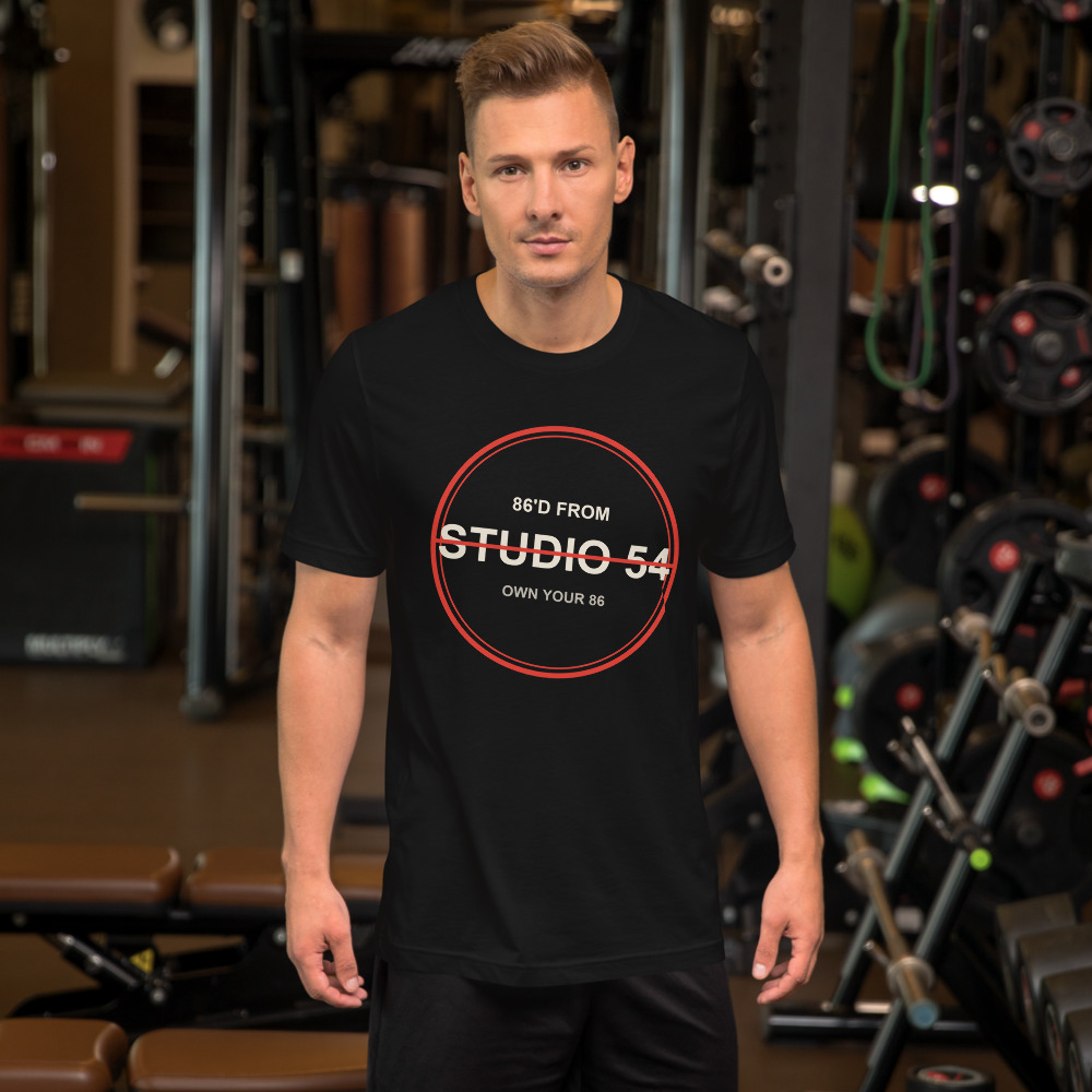 Man in a gym wearing the 86FROM Studio 54 black tee